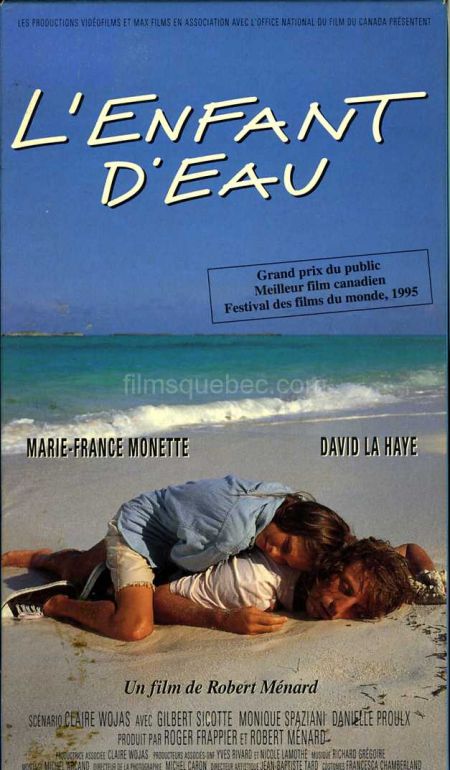 pochette VHS de L'enfant d'eau de Robert Ménard (les deux survivants du crash aérien sont enlacés sur la plage)