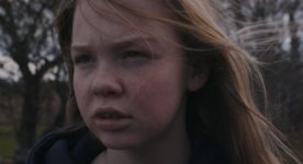 Visage de la jeune non-professionnelle Ève-Marie Martin dans le film Mad Dog Labine