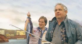 Les acteurs québécois David Boutin et Raymond Bouchard sur l'affiche de La grande séduction (Alliance Vivafilm, 2003)