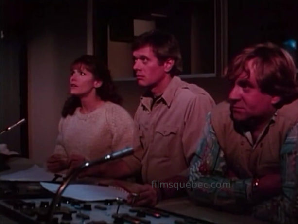 Michael Sarrazin, Margot Kidder et Vlasta Vrana dans le drame d'espionnage "Keeping Track" (Robin Spry, Les Films René Malo, 1986) - Capture d'écran ©filmsquebec.com