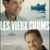 Les vieux chums - le visage souriant des deux comédiens principaus sur l'affiche, avec en arrière plan une barque sur une mer calme.