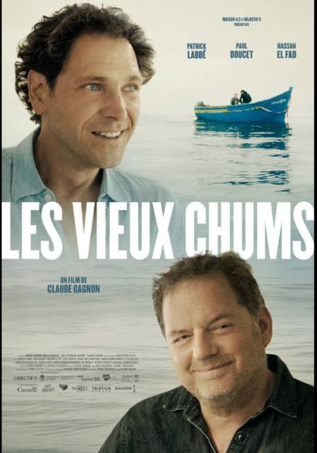 Les vieux chums - le visage souriant des deux comédiens principaus sur l'affiche, avec en arrière plan une barque sur une mer calme.